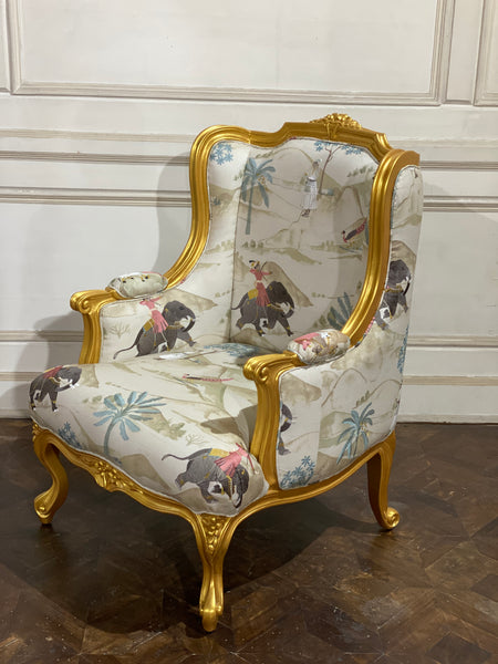 French wing back chair with sleek silhouette