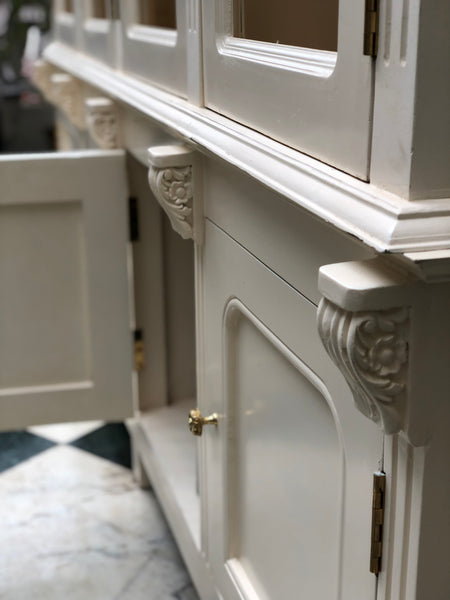 Armoire of neo-classical features perfect for a library