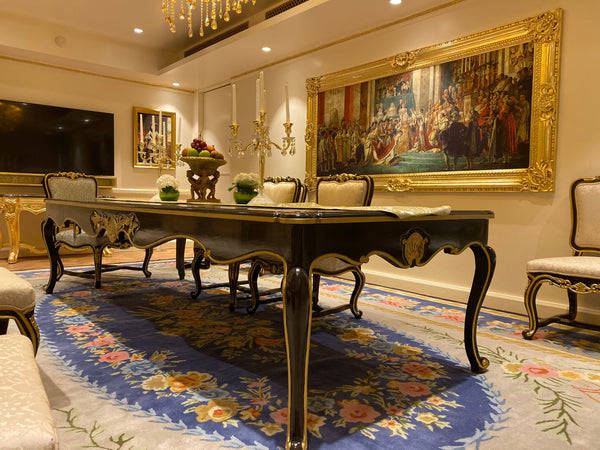 Dining table of Louis XV era with subtle rococo sensibilities