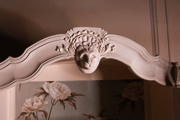 French Renaissance inspired armoire with lion motif