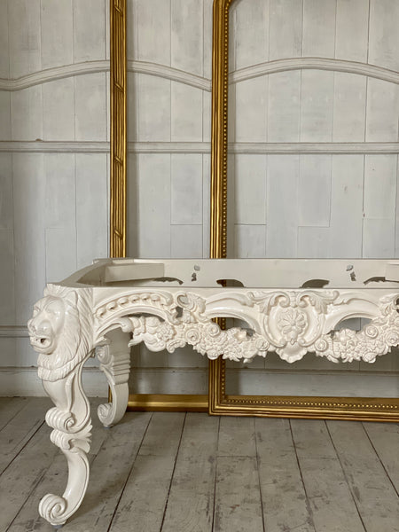 Louis XV center table with lion heads and rare scrolls
