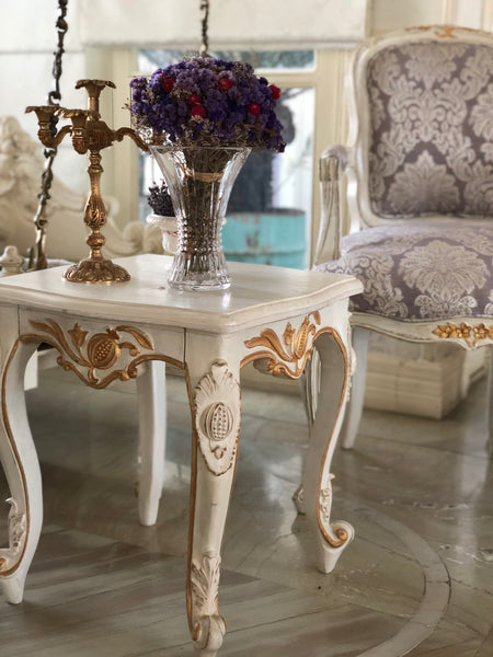 Side table of Louis XV elegance with pomegranate motif