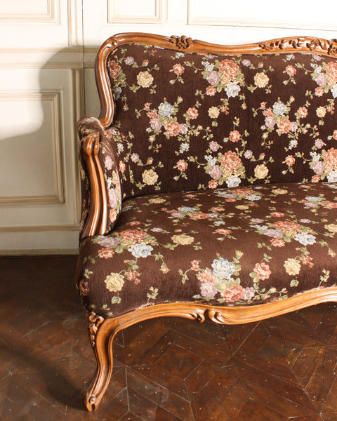 Sofa of significant Louis XV features, seating for five