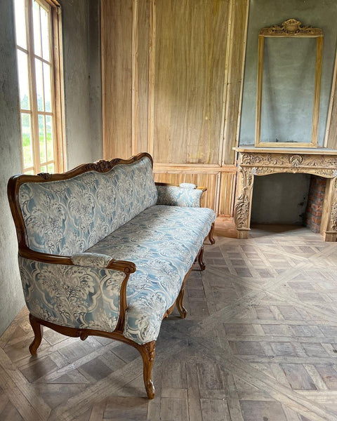 Louis XV sofa of graceful curves