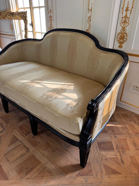 Sofa of simple Louis XVI sensibilities
