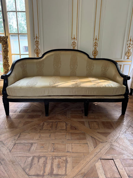 Sofa of simple Louis XVI sensibilities