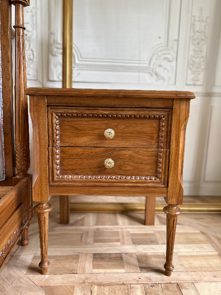 Louis XVI side table / nightstand of subtle country features