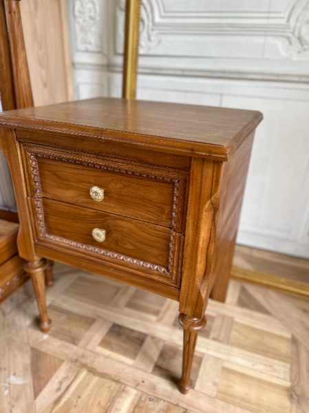 Louis XVI side table / nightstand of subtle country features