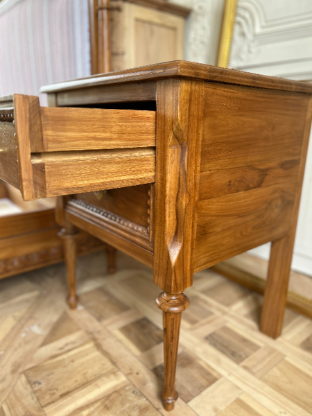 Louis XVI side table / nightstand of subtle country features