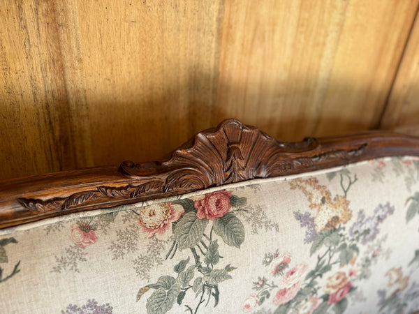 Louis XV settee with naturalistic motifs ~