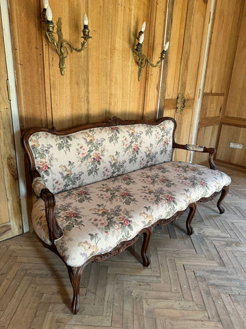 Louis XV settee with naturalistic motifs ~
