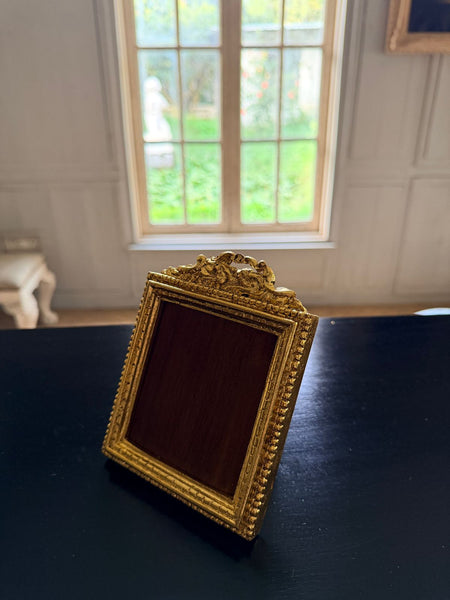 Louis XVI petite frame with scrolled cartouche~