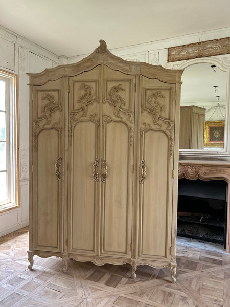 Country style Louis XV armoire with intense carving