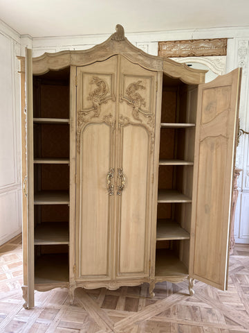 Country style Louis XV armoire with intense carving