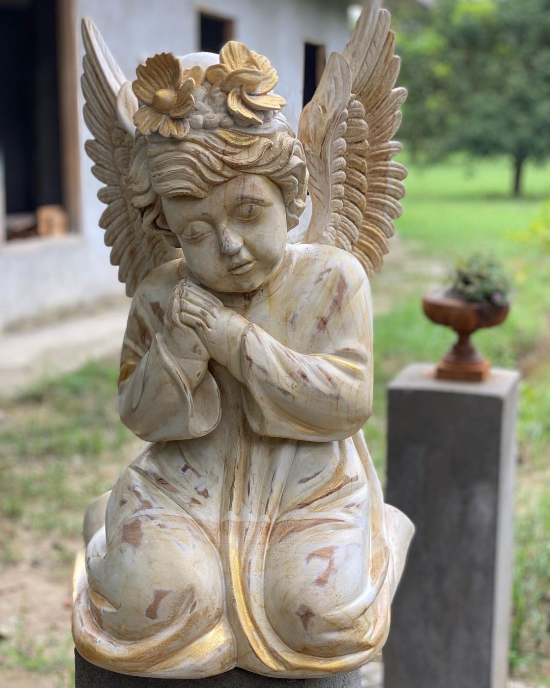 Seraph in prayer sculpture