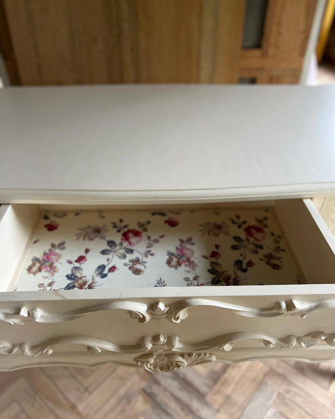 Rococo desk / dresser with exuberant scrolls