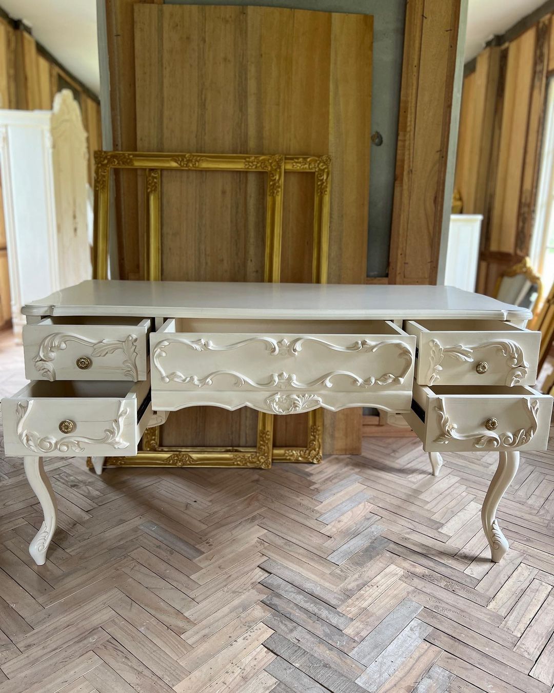 Rococo desk / dresser with exuberant scrolls