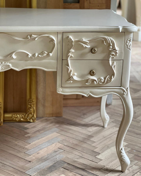 Rococo desk / dresser with exuberant scrolls
