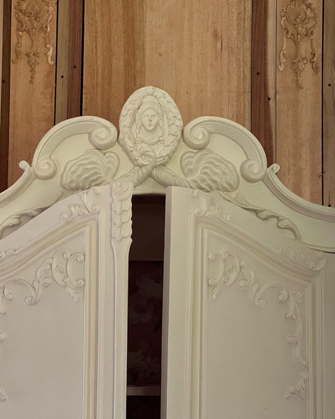 Rococo armoire with Apollo or Hera