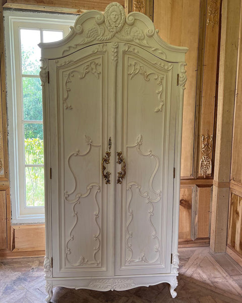 Rococo armoire with Apollo or Hera
