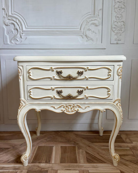 Louis XV side table with exuberant scrolls