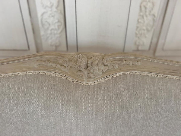 Louis XV bergère sofa of simple elegance
