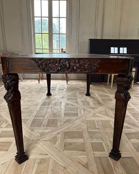 Dining table with caryatids