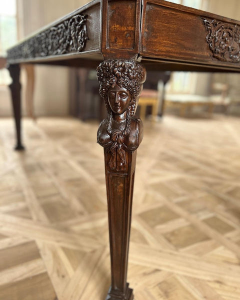 Dining table with caryatids