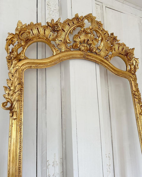 Rococo-style frame with scrolls