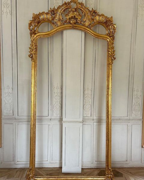 Rococo-style frame with scrolls