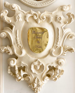 Cartouche nameplate based on rococo ornamentations