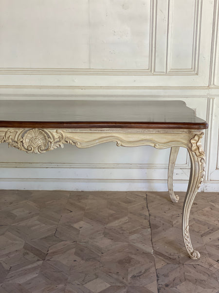 Dining table with unreasonably sleek rococo