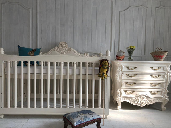 Surreal cot with intense rococo cartouche