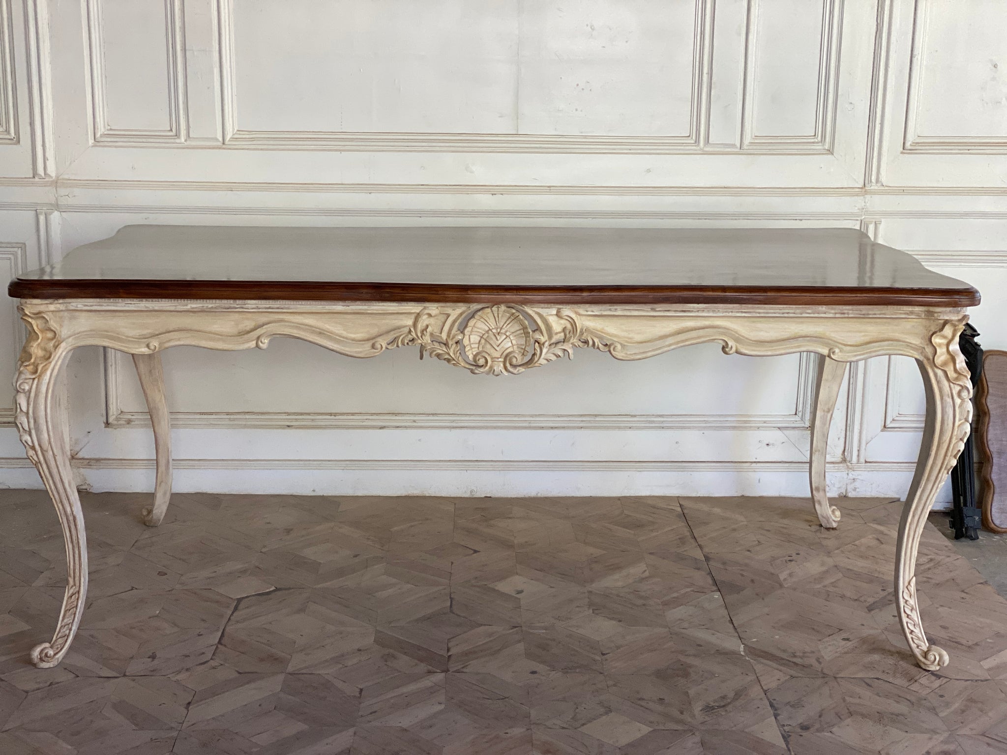 Dining table with unreasonably sleek rococo