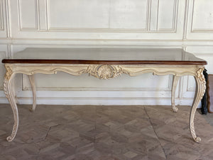 Dining table with unreasonably sleek rococo