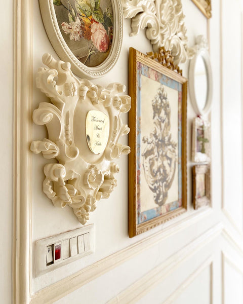 Cartouche nameplate based on rococo ornamentations