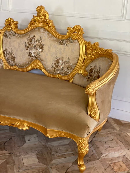 Louis XV sofa with cherub details