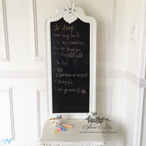 The exuberant yet minimal Louis XV black board