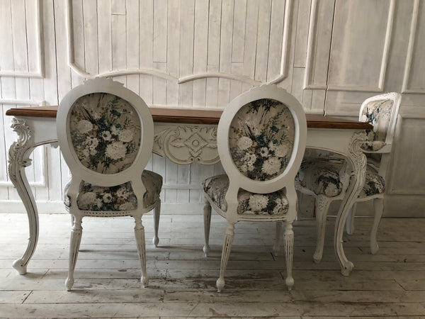 Louis XVI dining chair with roseate carving