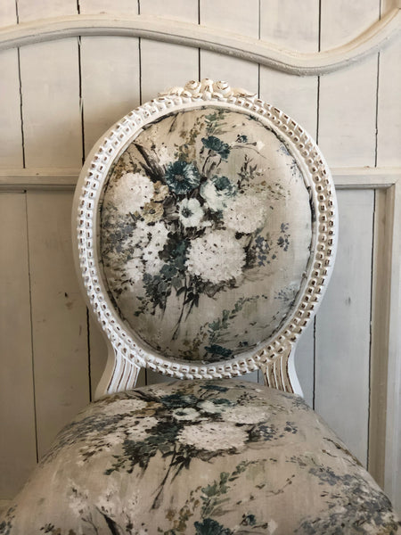Louis XVI dining chair with roseate carving