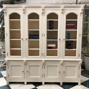 Armoire of neo-classical features perfect for a library