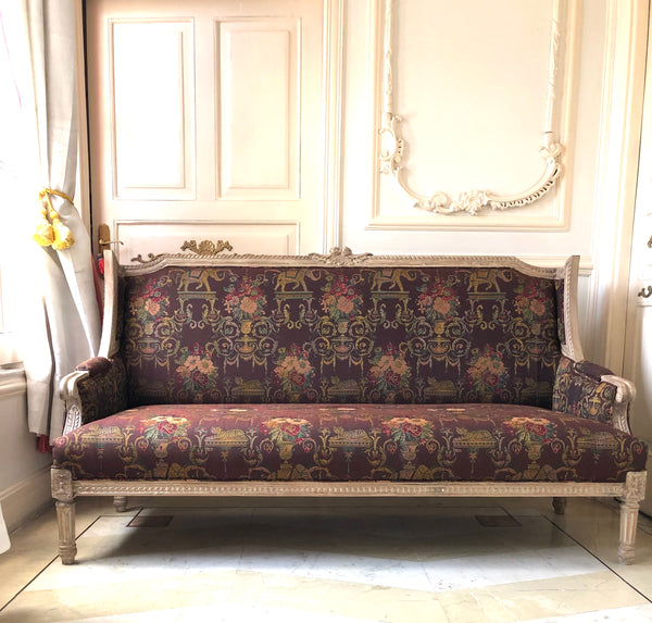Winged settee of Louis XVI brilliance