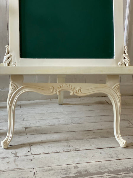 Easel with a ribbon from The Unfurling