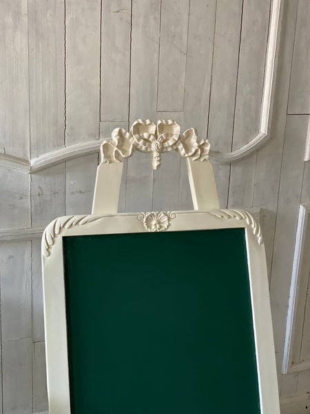 Easel with a ribbon from The Unfurling