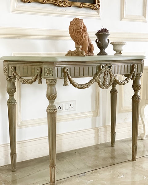 Console table of elegantly restrained Louis XVI sensibilities