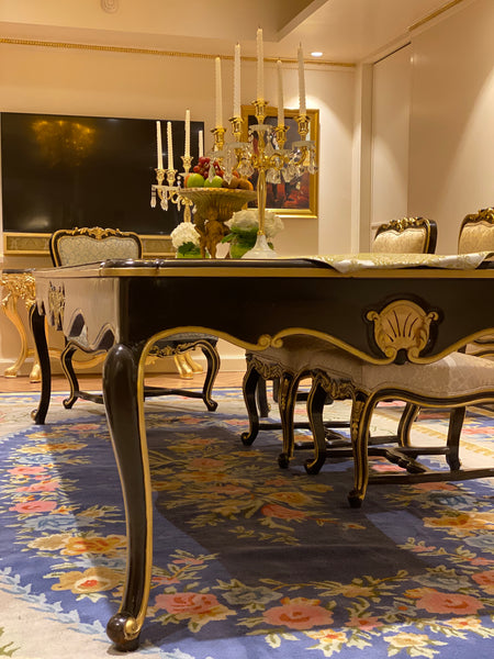 Dining table of Louis XV era with subtle rococo sensibilities