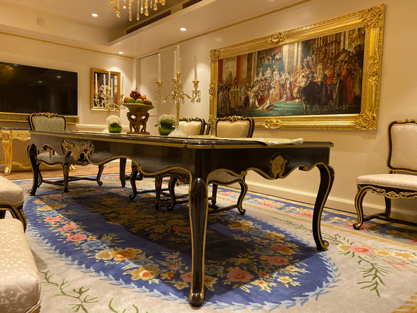 Dining table of Louis XV era with subtle rococo sensibilities