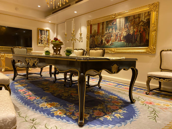 Dining table of Louis XV era with subtle rococo sensibilities