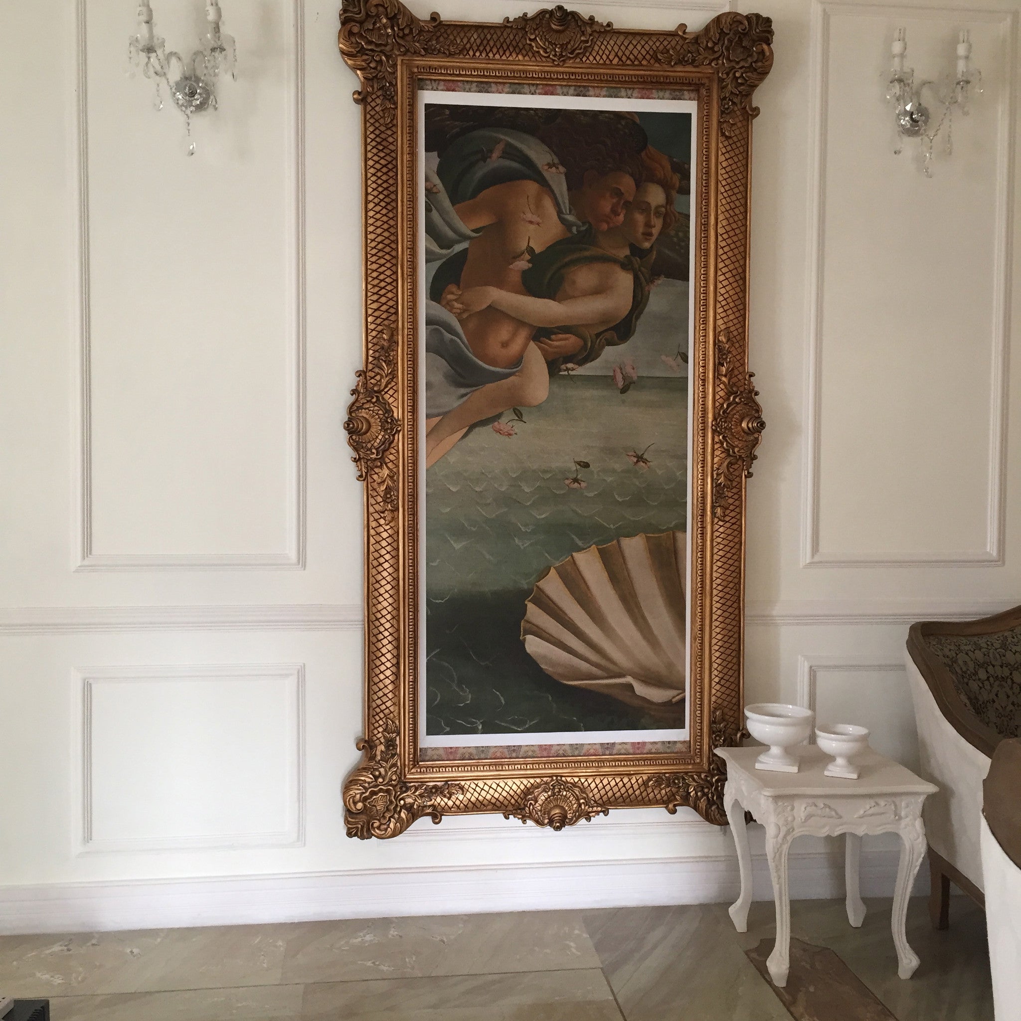 Frames of oversized proportions and rococo elements inspired by Louis XV