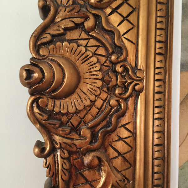 Frame of oversized proportions and rococo elements inspired by Louis XV